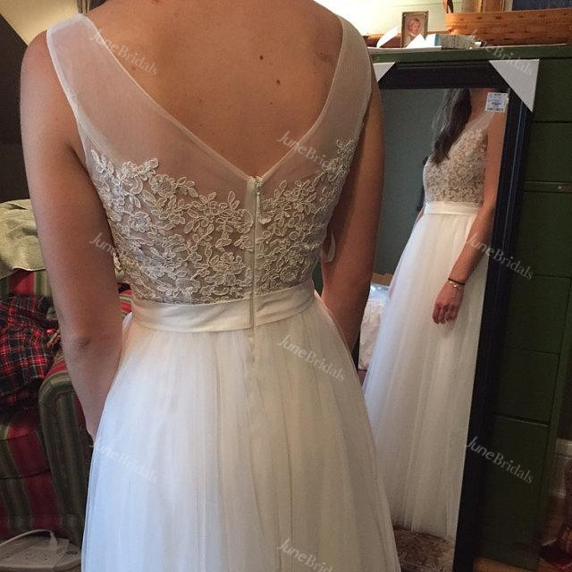 Bateau Sleeveless Low-V Back Tulle Wedding Dress With Sash And Appliques